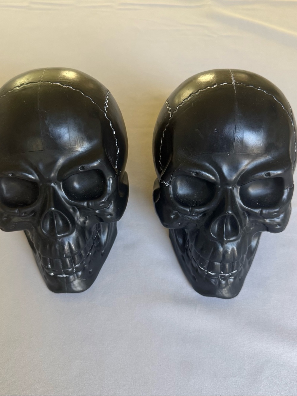 Black skulls with a grungy look home decor